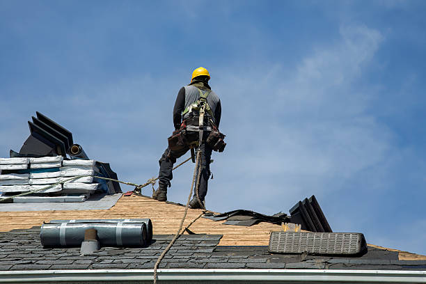 Professional Flat Roof Repair technician working in Traverse City, MI
